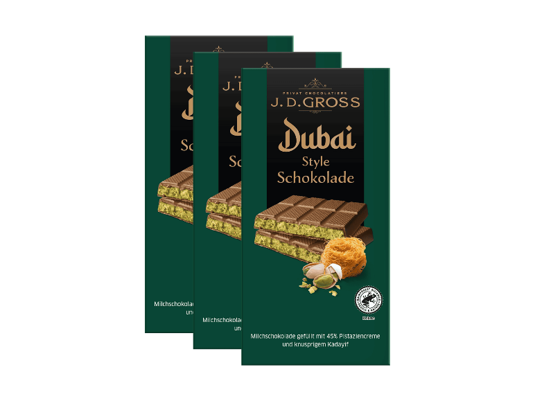 Drei J.D. Gross Dubai Style Schokoladentafeln in grüner Verpackung.