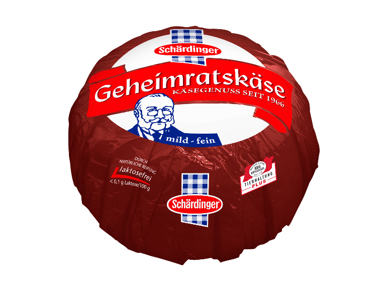 Laktosefreier Käselaib in roter Folienverpackung.