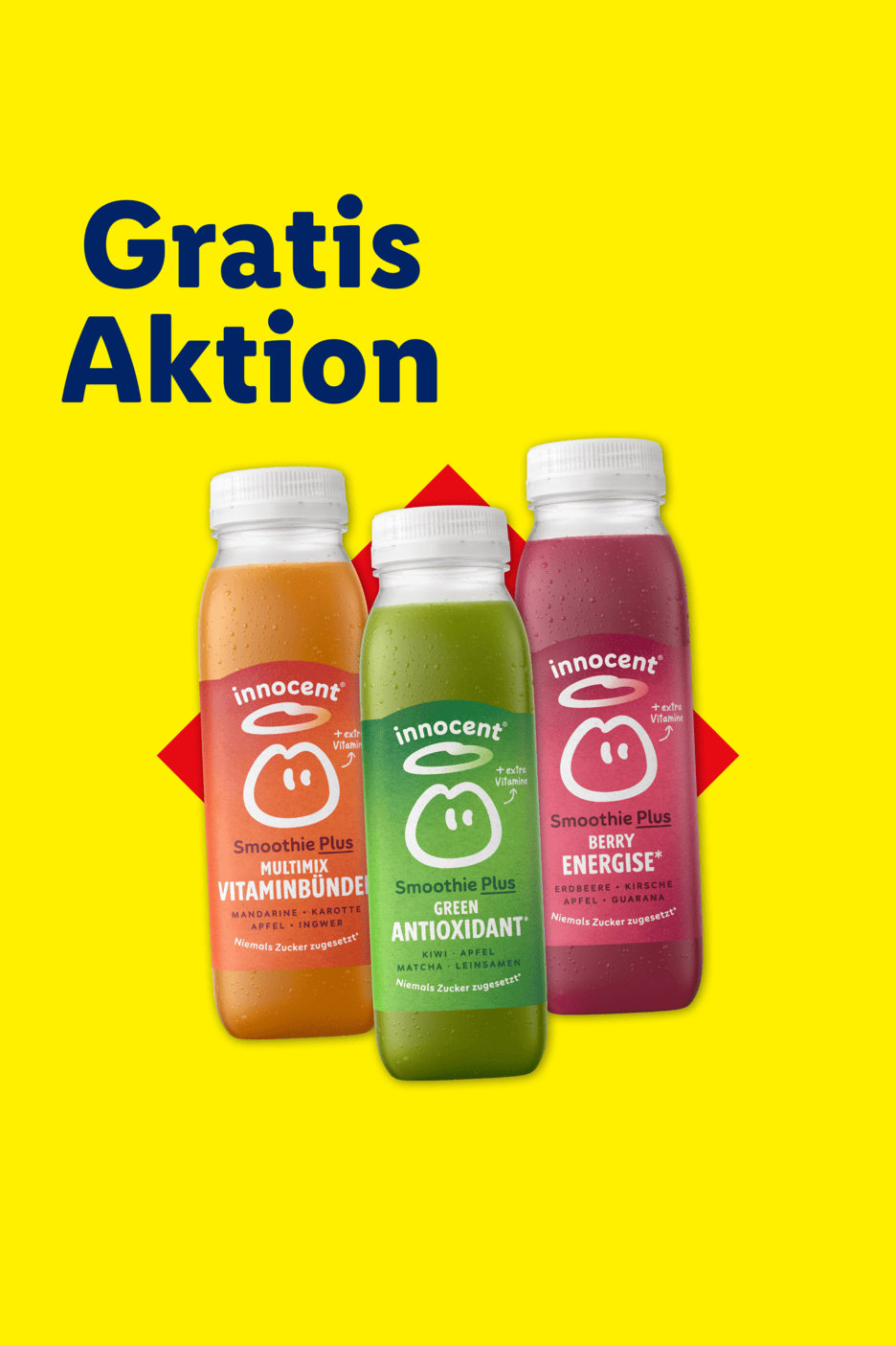 Drei Flaschen Smoothies in den Sorten Multivitamin, Grüner Antioxidant und Beeren-Energie mit der Aufschrift „Gratis Aktion“.