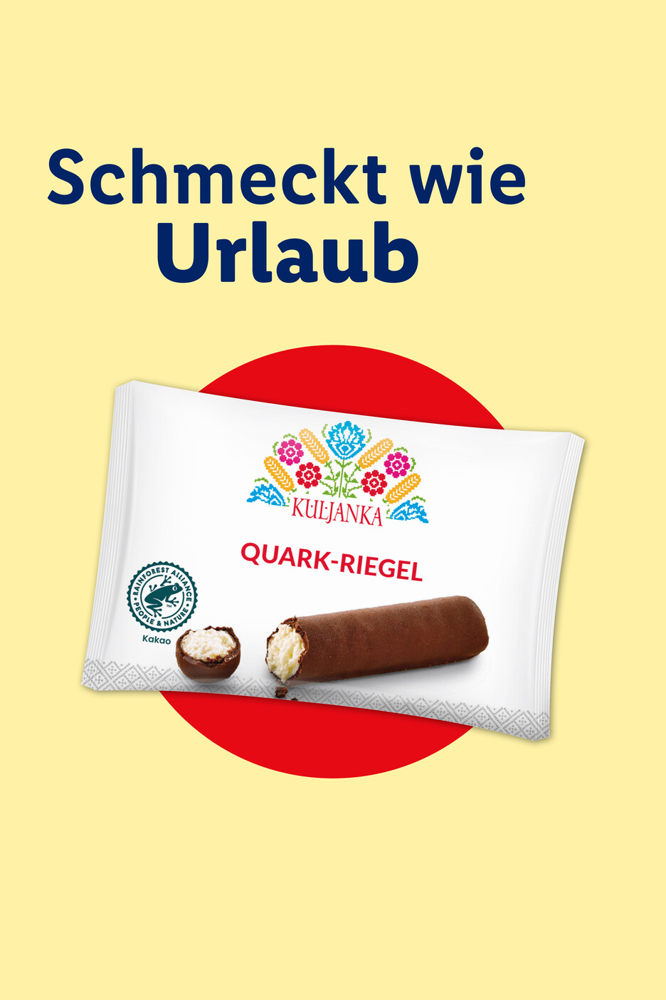 Quarkriegel mit Schokoladenüberzug und der Aufschrift „Schmeckt wie Urlaub“.