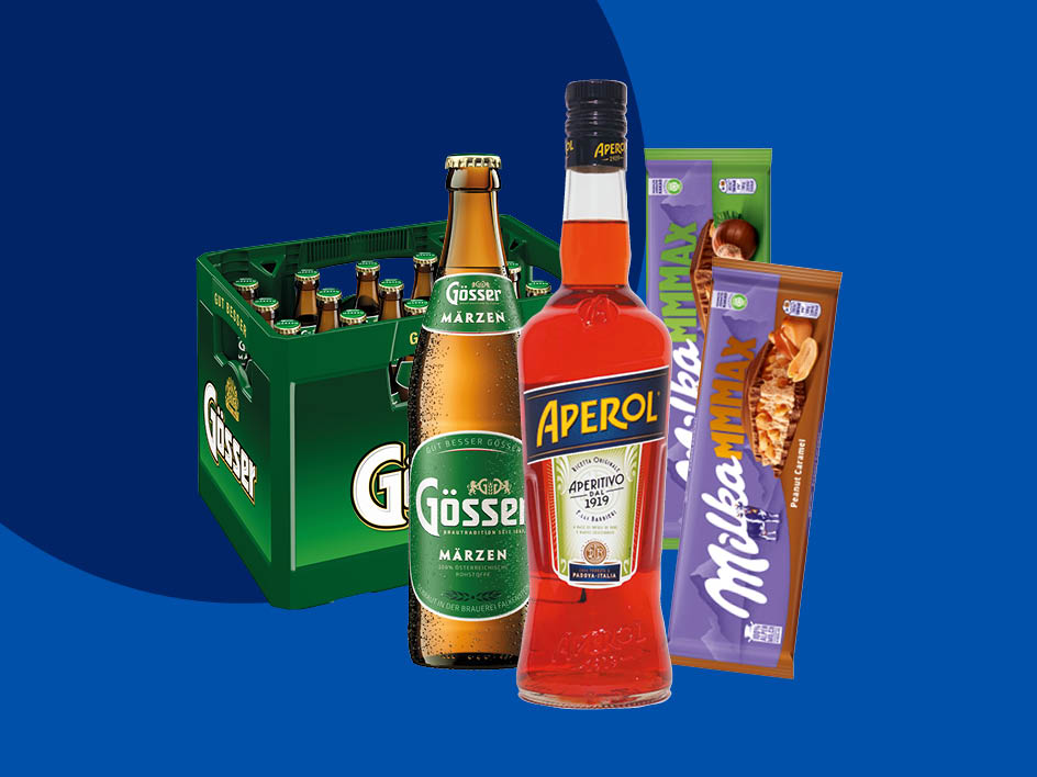 Ein Kasten Gösser Märzen Bier, eine Flasche Aperol und zwei Tafeln Milka MMMAX Schokolade.