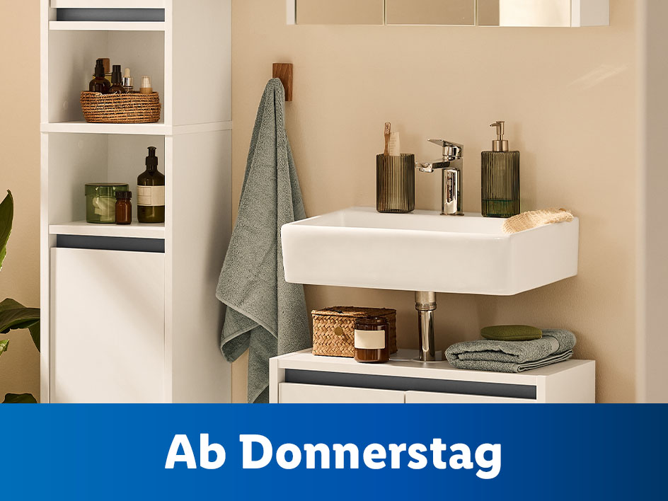 Modernes Badezimmer-Set mit Waschbecken, Unterschrank und Regal, ab Donnerstag erhältlich.