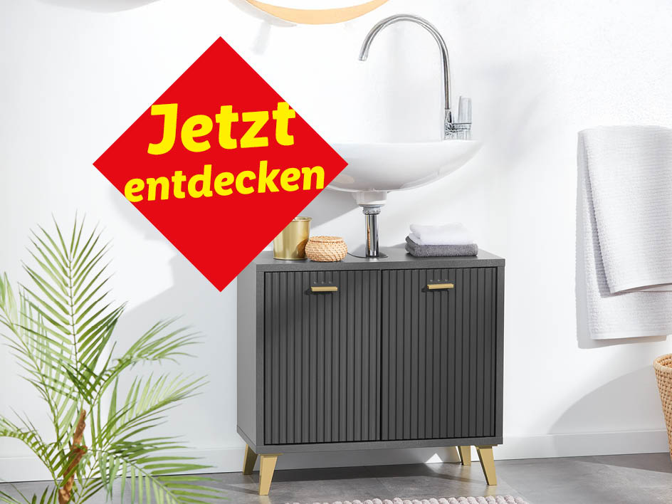 Badezimmerschrank mit Waschbecken und einem roten Banner mit der Aufschrift 'Jetzt entdecken'.