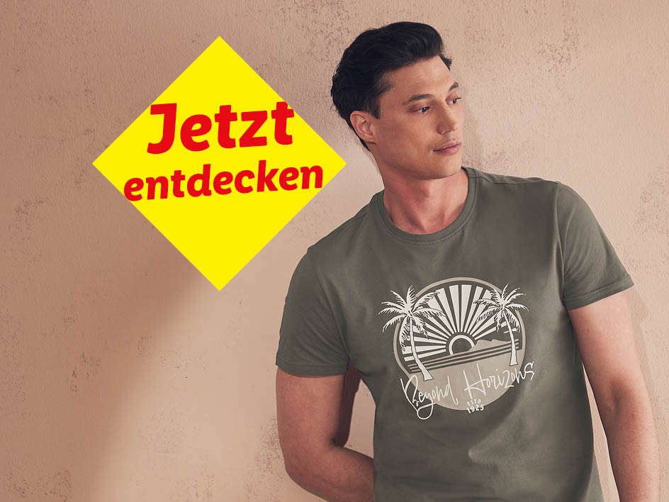 Mann trägt olivgrünes T-Shirt mit Palmenmotiv. Jetzt entdecken!