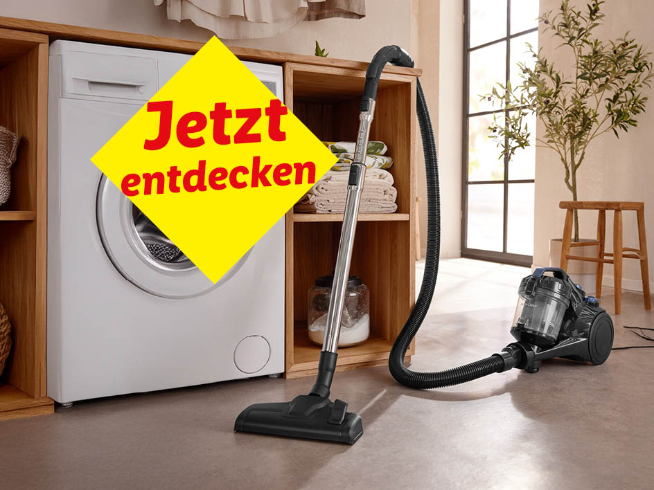 Ein neuer Staubsauger steht neben einer Waschmaschine in einem hellen Raum.  Jetzt entdecken!